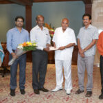 CES Limited presenting keral relief fund cheques to mr.ramojirao.